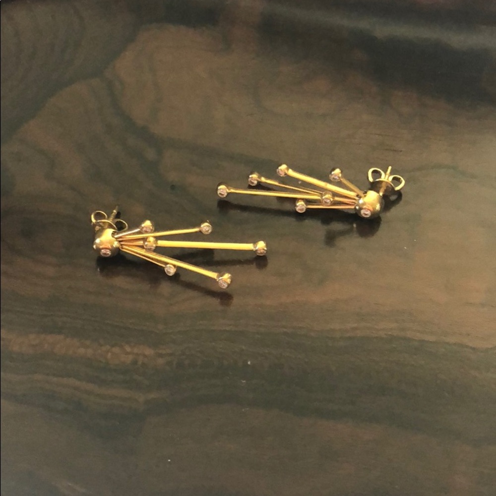 Movado yellow 14k gold drop starburst earrings